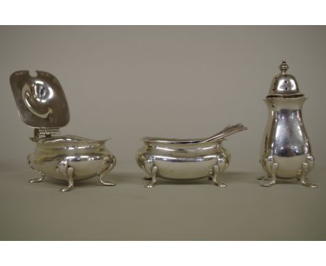 A silver three piece condiment set,&nbsp;by Walker &amp; Hall,&nbsp;Birmingham 1927, 109g. 