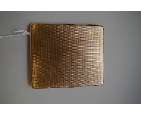 A gold engine turned cigarette case,&nbsp;hallmarked 9ct, 9.5 x 8.5cm, 102g. 