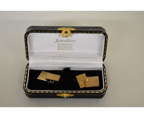 A pair of gold engine turned cufflinks, stamped 375, 4.6g. 