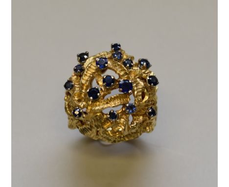 An Italian gold and sapphire studded cocktail ring, stamped 18k,&nbsp;20.8g. 