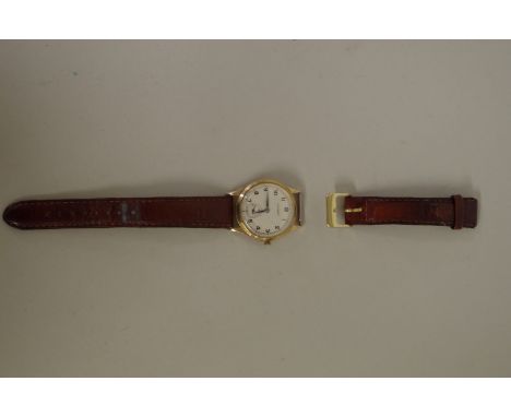A 1960s Garrard 9ct gold wristwatch, the signed silvered dial decorated Arabic numerals and subsidiary seconds dial, manual w