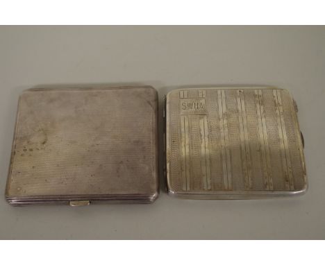 Two silver engine turned cigarette cases,&nbsp;237g. 