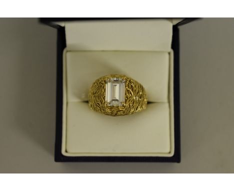 A good 18k gold and 2.1ct diamond ring, in the manner of Andrew Grima,&nbsp;the octagonal cut stone&nbsp;colour E/F, clarity 