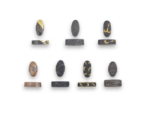 SEVEN FUCHI-GASHIRA (HILT COLLARS AND POMMELS)Edo period (1615-1868), 18th to 19th centuryThe first in Mino Goto style, shaku