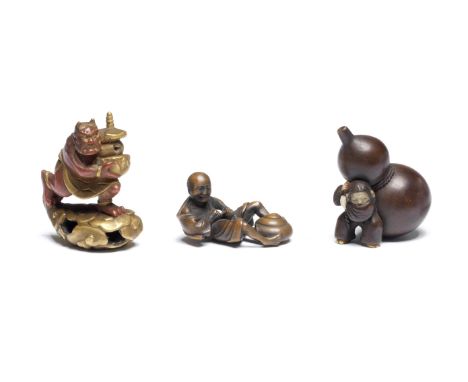THREE WOOD AND LACQUERED-WOOD FIGURE NETSUKEOne by Seiko, another by Chikusai, Edo period (1615-1868) to Meiji era (1868-1912