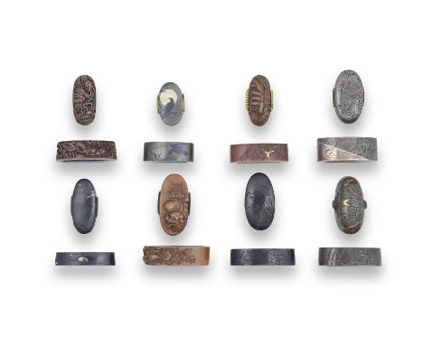 EIGHT FUCHI-GASHIRA (HILT COLLARS AND POMMELS)Edo period (1615-1868), 18th to 19th centuryThe first shakudo, chiselled in kat