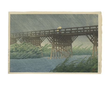 KAWASE HASUI (1883-1957)Showa era (1926-1989), dated 1932An oban yoko-e print, titled Imaibashi no yudachi (Evening Shower at