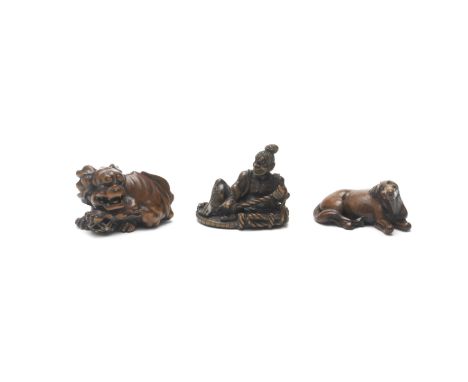 THREE VARIOUS WOOD NETSUKEEdo period (1615-1868) to Meiji era (1868-1912), 19th centuryThe first a recumbent horse with its h