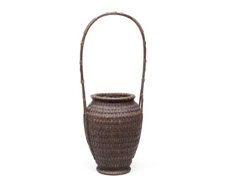 TANABE CHIKUUNSAI I (1877-1937)A Handled Basket in Chinese Style Taisho era (1912-1926), circa 1920Kanchiku (winter bamboo, C