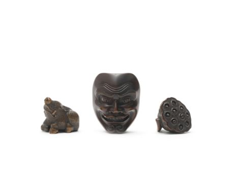 THREE WOOD NETSUKEEdo period (1615-1868) to Meiji era (1868-1912), 19th centuryThe first a recumbent boar, its head raised, t