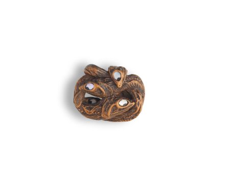 A WOOD NETSUKE OF A PILE OF FISHESBy Hidari Issan, Iwashiro, Edo period (1615-1868), early/mid 19th centuryFour dessicated th