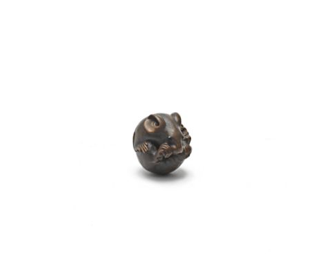 A WOOD NETSUKE OF A COILED MOUSEBy Masanao, Yamada, Ise Province, Edo period (1615-1868), early/mid 19th centuryTypically cur
