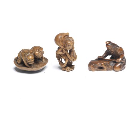 THREE BOXWOOD NETSUKEOne by Hojitsu, Edo period (1615-1868) to Meiji era (1868-1912), 19th centuryThe first an oni (demon) an