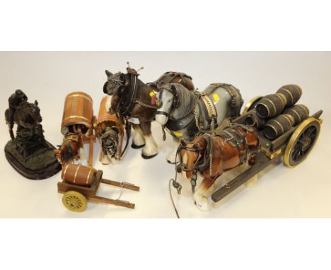 Five ceramic model horses with accessories, including tack and carriages, and a cold cast eventing horse, on stand