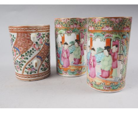 A pair of Canton enamel decorated spill vases with figure panels, 4 3/4" high, and a Chinese porcelain tankard with spiral en