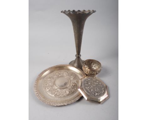 An Oriental embossed card tray, a smaller similar bowl, a Chinese compact, fitted mirror, and a trumpet vase 