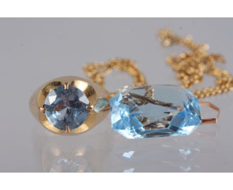 A 14ct gold and blue topaz ring, size K, 6g, and a similar pendant (as found), on 9ct gold flat curb link chain, 8.7g 