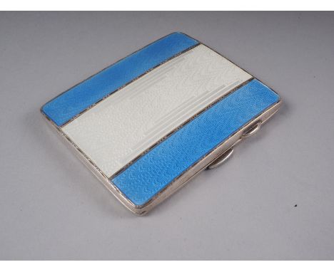 A white and gilt metal engine turned and enamel cigarette box, 3.2oz troy approxCondition:Small ding to one side.Enameling is