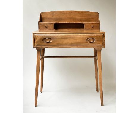 ERCOL WRITING TABLE, by Lucian Ercolani, 1970's, elm, with galleried superstructure, frieze drawer and stretcher, 69cm W x 47