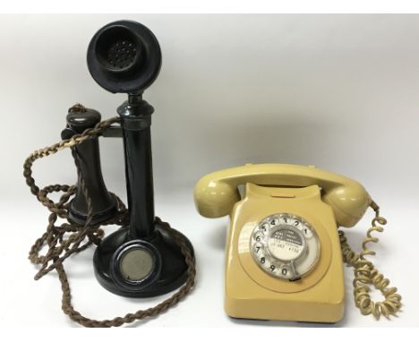 Two vintage telephones.