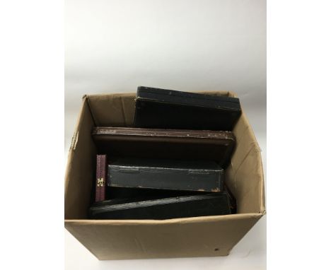 A collection of vintage boxes and cases.