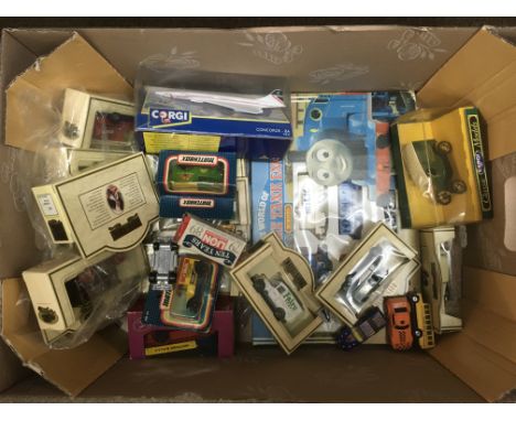 A box of various die cast vehicles, a boxed Hornby Thomas The Tank Engine set etc.