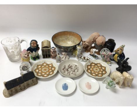 An interesting collection of collectible ceramic items.