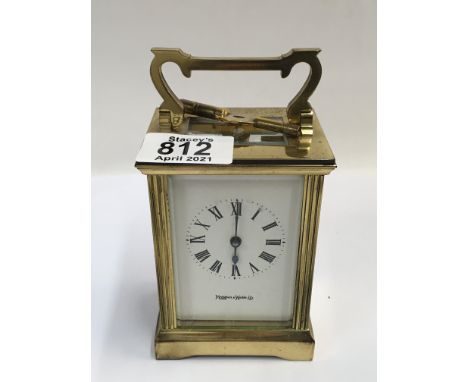 A Mappin &amp; Webb 4 glass brass carriage clock.