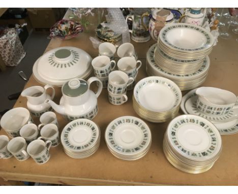 A Royal Doulton dinner service in Tapestry pattern.