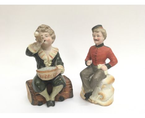 Victorian coloured bisque figure of â€œPears Bubblesâ€ young boy sitting on log blowing bubbles from pipe and Victorian colou