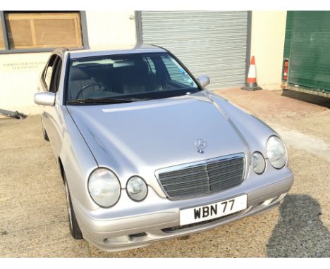 A silver Mercedes E200 classic Kompressor car A four door saloon. The car sold with one years MOT. Only one previous owner an