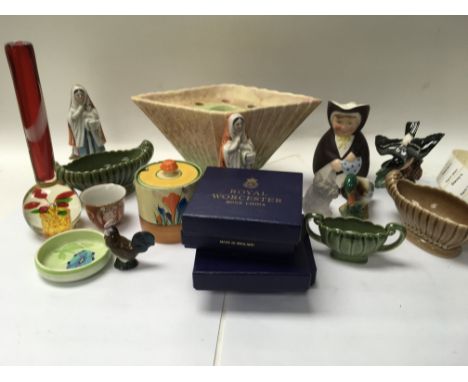 A collection of ceramic including a Clarice cliff preserve jar .