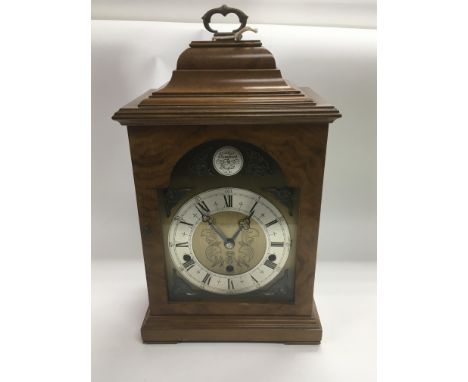 A walnut cased Carrington &amp; Co mantle clock.