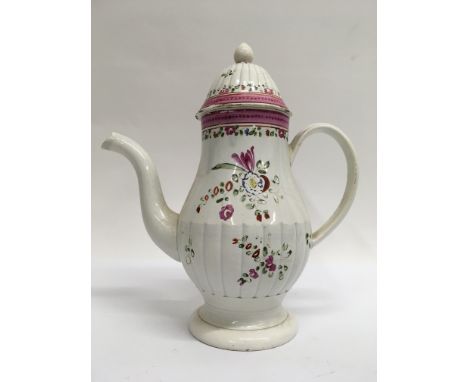An 18th century English Pearl ware coffee pot decorated with flowers and foliage. 22cm height approx