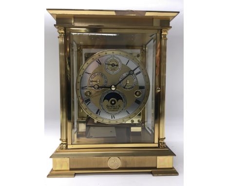 A new Millennium Golden collection mantle clock by Sewills Of Liverpool. The dial with Day date and second Subsidury dial. He
