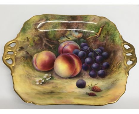 Two Royal Worcester plates decorated with fruit and foliage . Width 17.5cm and 24cm approx