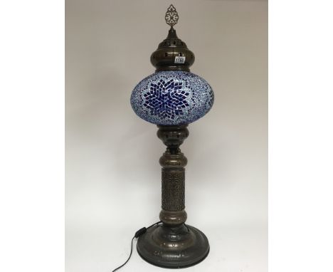 A large Moorish style lamp in colours of blue in the geometric pattern. Height 95cm approx - NO RESERVE