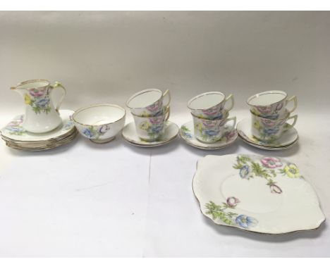 A Salisbury fine bone China floral tea set comprising of 6 saucers 6 tea cups 6 side plates one large bowl one jug and one la