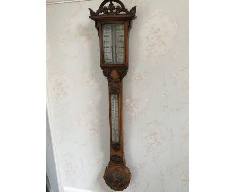 A Quality late Victorian oak stick barometer maker T R winter of Newcastle. Length 110cm.