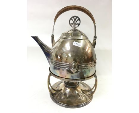 A WMF Arts and crafts design silver plated kettle and stand.