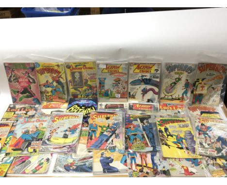 A large quantity of comics. There are 52 60 &amp; 70s DC comics including 2 giant page ones. Superman, Lois Lane, Flash, Batm