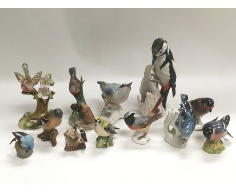 A collection of ceramic birds, various makes including Goebel, Beswick and others.