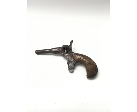 A small vintage obsolete Belgian pistol. Approximately 12.5cm in length.