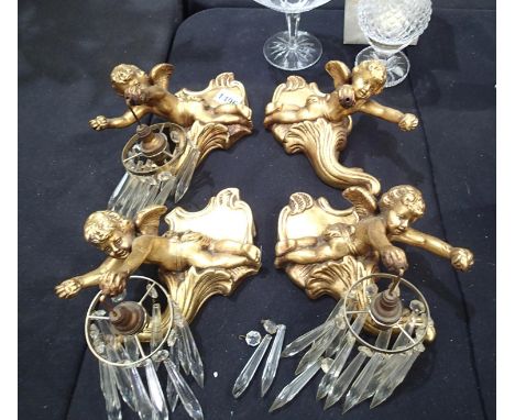 Four plaster cherubs, three with crystal drop light fittings. Cherubs are L: 30 cmCondition Report: No damage to Cherubs, one