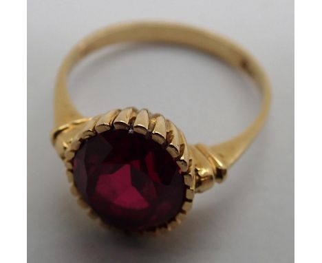 An 18ct gold ruby solitaire ring, 3.4g size M1/2 