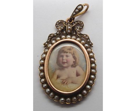 An unmarked gold (presumed 15ct) oval mourning locket, double sided with portrait of a young girl surrounded by seed pearls a