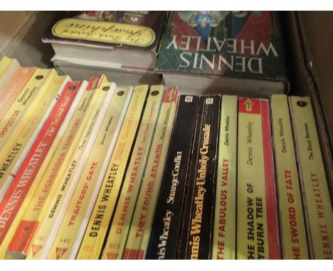 Quantity of Dennis Wheatley hardback and paperback books including First Edition examples 