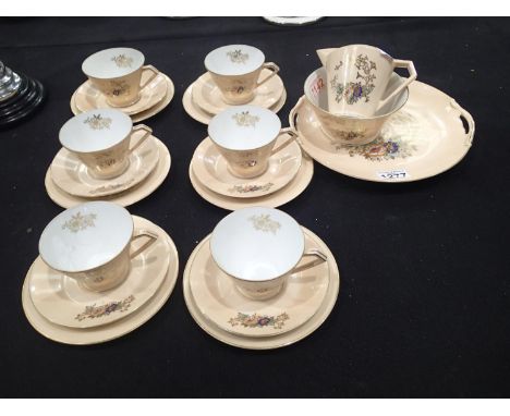 Noritake enamelled tea set, twenty-one piecesCondition Report: No cracks, chips or visible restoration. Some wear to gilt. P&