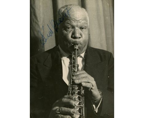 BECHET SIDNEY: (1897-1959) American jazz saxophonist and clarinettist, one of the first important soloists in jazz. A good, r