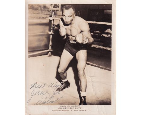WALCOTT JERSEY JOE: (1914-1994) American boxer, World Heavyweight Champion 1951-52. Vintage signed sepia 8 x 10 photograph of